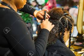 For gentlemen and gentlewomen on the go. Close Up African Hairstylist Braided Hair Of Afro American Female Stock Photo Picture And Royalty Free Image Image 113942917