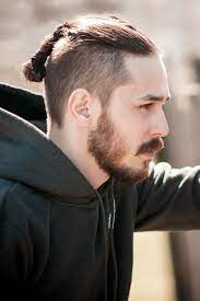 Meet The Versatile Variations Of The Daring Mohawk Haircut Mohawk Haircut Mens Hairstyles With Beard Long Hair Styles Men