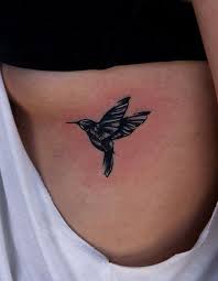 Attractive Bird Tattoo On Hand For Girls Cool Tattoo Design Ideas Small Black Hummingbird Tattoo Hummingbird Tattoo Bird Tattoo Ribs Rib Tattoo
