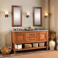 Lavatories and the sculptural tub in pristine white provide a sharp contrast in the color palette. Bathroom Vanities Cabinets Elegant Bathroom Vanities Wellborn
