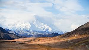 The highest mountain on the mainland of australia is mount kosciuszko at 2,228 metres above sea level (7,310 feet, or approximately 1.3844 miles). Why The Tallest Mountains In The U S Are Almost The Same Height Conde Nast Traveler