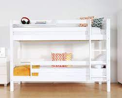 Crafted of solid pine wood, this bunk bed strikes a classic. Nordic Bunk Bed