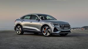 2021 Audi E Tron Review Pricing And Specs In 2020 Audi E Tron Audi Hybrid Hybrid Car