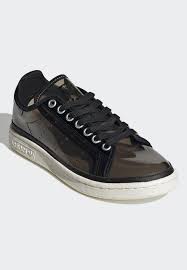 Habillée d'un cuir raffiné et perforée de petits trous d'aération, cette basket innovante mettait dans les meilleures conditions pour la pratique sportive. Adidas Originals Stan Smith W Sneaker Low Black Schwarz Zalando De