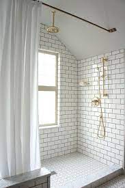 Make your white subway tiles really pop by using a darker color grout, or get even more dramatic by adding a. Love The Dark Grout With White Tiles And Brass Hardware White Brick Tiles Bathroom Brick Tiles Bathroom White Brick Tiles