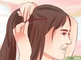 Once your chosen solvent has been on the hair for at least an hour, begin teasing the glue out with a fine tooth comb. 4 Ways To Take Hair Extensions Out Wikihow