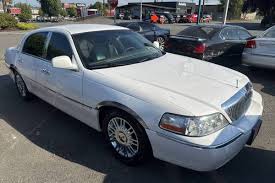 Image result for Light Ice Blue 2009 Town Car