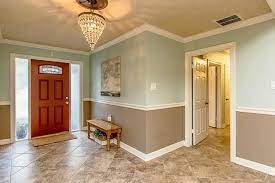 Camille's walls, ceiling, curtains, and even the accent pillow on the rocking chair are all slightly different versions of the same hue. Are Two Tone Walls Making A Comeback Here Are 20 Examples