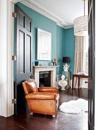 Soothing Study Walls Harmonized With White Trim And Neutral Accessories The Black Doors Add Victorian Home Decor Victorian House Colors Victorian Living Room