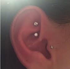 Pin By Madison Ore On Piercings Pagoda Earings Piercings Cute Ear Piercings Tragus Piercings