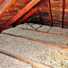 Saving Energy Blown In Insulation In The Attic Finished Attic Blown In Insulation Attic Ventilation