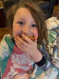 Kid enjoys avocado toast