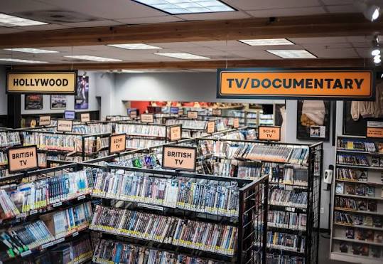 Today's video store spotlight is @moviemadness_pdx in Oregon. Movie Madness  is a Portland institution. Known for its vast collection, knowledgeable  staff, and display cases full of legendary film props, the iconic Belmont