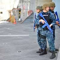 Machinist's Mate 2nd Class Karl Anthony gives aft steering