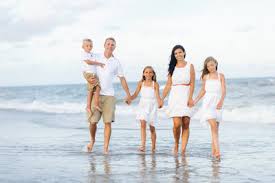We've all seen the photos of smiling families in matching outfits on the beach. What To Wear For Family Photos At The Beach Pasha Belman