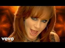 Strange by Reba McEntire