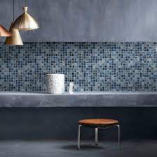 By keeping the walls and the vanity simple and neutral, the designer is able to experiment with the shower and floor tiles and create a load of visual interest with this starburst pattern. China Interior Design Bathroom Swimming Pool Tiles Glass Mosaic China Mosaic Mosaic Tiles