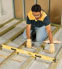 Maybe you would like to learn more about one of these? Install A Wooden Subfloor To Help Insulate Flooring From Cold Concrete A Little Bit Of Work Now Will Make A Big Differenc Garage Remodel Flooring Diy Basement