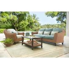 Home Decorators Collection Camden Light Brown Seagrass Wicker Outdoor Patio Sofa With Sunbrella Cast Spa Fretwork Mist Cushions Fra60624atsw The Home Depot Outdoor Furniture Sets Outdoor Furniture Cushions Outdoor Furniture