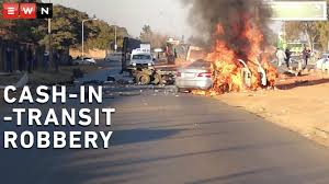 Driver gets shot at, south africa. People Help Themselves To Money After Krugersdorp Cash In Transit Heist