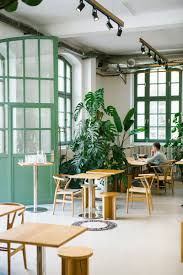 Bonaza Coffee Roastery In Terms Of Aesthetics Bonanza Wins In Berlin Tucked Behin Restaurant Interior Design Cafe Interior Design Coffee Shop Interior Design