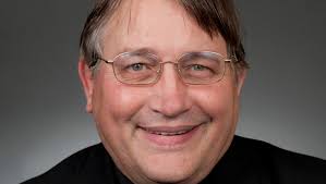 Catholic priest placed