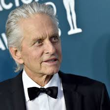Michael Douglas' slicked-back hair is still resplendent