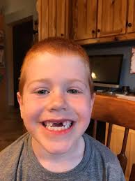 Billy Corbett, in 1971, breaking the world record in number of bricks  broken by hand at one time. Billy broke over 2000 bricks over the course of  three straight days, in hopes