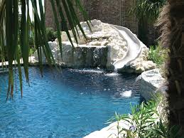 Building your own swimming pool from the very first step to the finishing touches that get everything going seems to be a daunting task, but taking a look at this guide, you would already be planning to gift a gorgeous pool to your outdoor space even. Modern Diy Pool Slide Home Ideas For Your Home Fun Of Having A Diy Pool Slide Fun Of Having A Diy Pool Slide