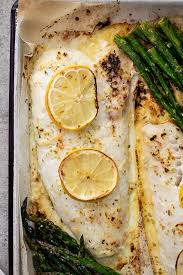 To be fair, he cooks and she eats! Easy Lemon Butter Baked Fish Simply Delicious