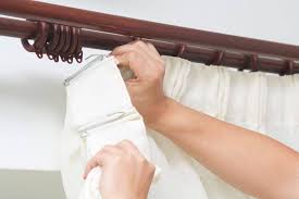 Inserting metal pin hooks into curtains and drapery can be painful on the hands and fingers. How To Hang Pinch Pleat Curtains 5 Steps Home Decor Bliss