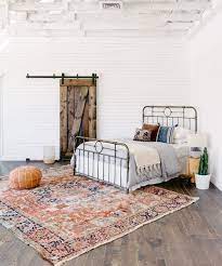 Whether you want to call it boho or bohemian, this chic style is full of different colors, patterns, textures, themes, and decorations that are used to create an artistic aesthetic. Your New Favorite Bohemian Home Decor Site Loom Kiln Persian Rug In A Bohemian Bedroom Bohemian Bedroom Design Bedroom Vintage Home Decor Sites