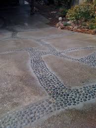 A Creative Low Cost Way To Deal With A Cracking Driveway First You Widen The Cracks A Little Then Repair Concrete Driveway Driveway Design Building A Deck