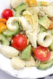 Hearts Of Palm Salad With Artichoke Hearts Cucumber And Avocado Recipe Hearts Of Palm Salad Recipes Artichoke Salad