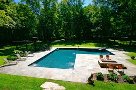 L Shaped In Ground Gunite Pool Complete With Diving Board Corner Fountains And Sports Inserts Built Gunite Pool Pools Backyard Inground Backyard Pool Designs