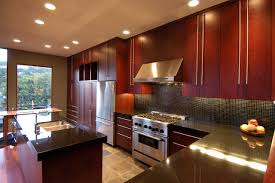 Timeless dark cherry kitchen cabinets accented with aged elements, like seeded glass and oil rubbed bronze hardware, keep a balance between old and new. Cherry Cabinets Kitchen Houzz