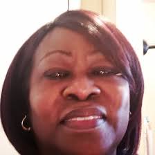 Mean. Green. Smiling.