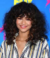 Top 15 curly haired undercut styles #1: Long Curly Hair Styles With Bangs