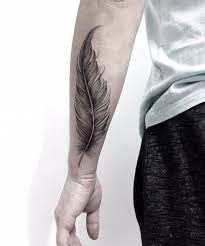Bird Tattoos For Guys Meaning 99 Elegant Men Tattoo Design Ideas On 2019 Tattoo Design Us Is Set Up Differently To Other Arm Tattoos For Guys Feather Tattoo For Men Feather Tattoo Design