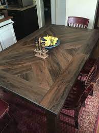 Shop dining tables to match any décor, from round dining tables, wooden tables and more! Vinyl Peel And Stick Planks On Table Top For Durability Style Sections Antique Woodland Oak Farmhouse Dining Room Table Diy Dining Room Large Farmhouse Table