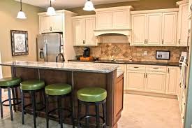 Fabuwood Cabinetry Wellington Ivory Finish Wellington Spice Two Tone Kitchen Cabinets Two Tone Granite Kitchen Renovation Cabnits Kitchen Kitchen Redesign