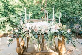Sweetheart Table Arrangement Draping Cascading Sweetheart Table Flowers At The Villa Table Flower Arrangements Sweetheart Table Flowers Wedding Table Flowers