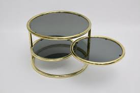 Located in keego harbor, mi. Swiveling Coffee Table In Brass Smoked Glass 1970s For Sale At Pamono