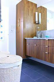 The modern bathroom is very gross and net decoration and the use of the color white. A Mid Century Modern Inspired Bathroom Renovation Before After Dans Le Lakehouse