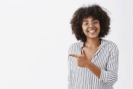 Before your next hair appointment, browse our extensive photo collection of curly hairstyles for women with curly hair. Free Photo Creative Friendly Looking Charming African American Girl With Curly Hairstyle In Stylish Overalls And Bracelet Pointing Left