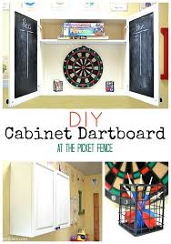 A dartboard doesn't do anybody any good if it isn't attached to a wall properly. Diy Kitchen Cupboard Turned Dartboard Cabinet