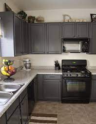Driftwood grey, bristol chocolate, and york chocolate kitchen cabinets would all be great examples of colors and stains that combine well with black appliances. Charcoal Grey Kitchen Cabinets Kitchen Cabinets Before And After Black Appliances Kitchen Kitchen Redo
