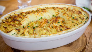 Joanna Gaines Smothers Her Scalloped Potatoes With Garlic And Cheese Recipe Recipes Scalloped Potato Recipes Food