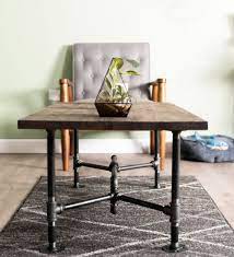 We chose alder wood and used an eco wood treatment to age the wood.it's super easy! Loop Coffee Table By Pipe Decor Pipe Decor