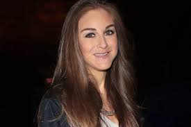 Imogen Thomas appears in deep thought as she spends time with children  after furious Pete Bennett row